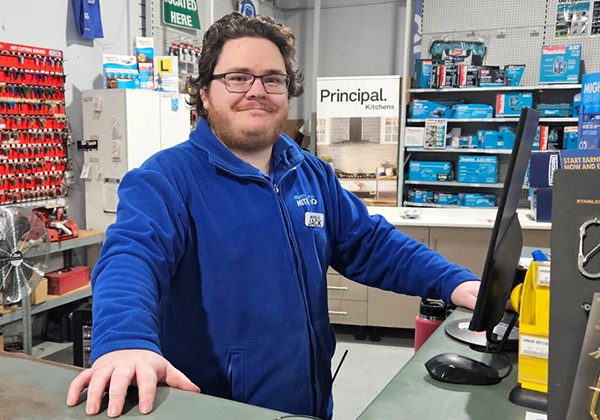 Jack Wheeler behind the counter at Mitre 10 Moree