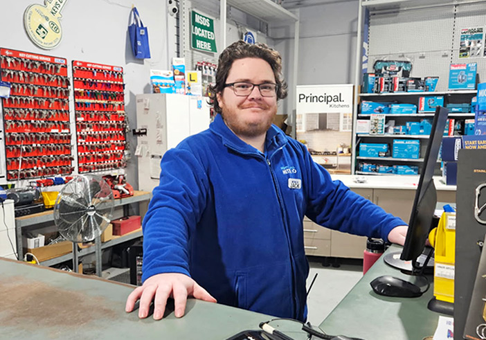 Jack Wheeler behind the counter at Mitre 10 Moree